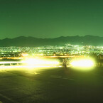 ヘッドライトと夜景