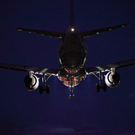 Lights of a runway reflected in the body