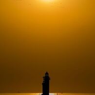 灯台と夕陽　その1