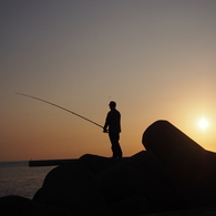 A sunset and angler