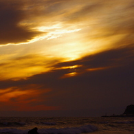 夕焼けと写真家