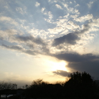 雲から夕日