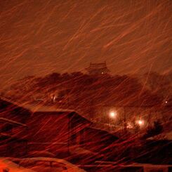 雪降る久保田城