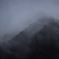 The mountain was covered in deep fog