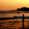 sun set over the waves