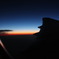 飛行機の中の夕日