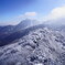 雪に覆われる九重連山