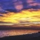 I watched the sea in fiery evening.