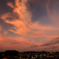 屋上夕焼け 雲舞う