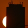 荒川土手から池袋のサンシャインビルの夕日