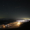夜景と湖と霧と星と飛行機