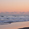 Light-colored sky and rough sea