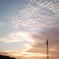 空と夕日と雲と
