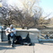 a grandpa with a guitar at the park