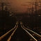 夕日に光る線路