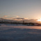 雪原と夕陽