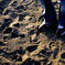 Foot on the sand.