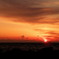 夕日と船