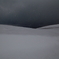 雪舞う丘～暗い海を望む～