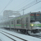 雪の中を最後の力走をする２０５系