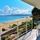 a balcony overlooking the vivid blue... 