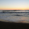 夕日と波打ち際