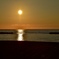 穏やかな日本海に溶ける夕陽