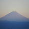 夕日を浴びる富士山