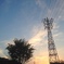 夕日 と 送電塔
