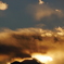 富士山と夕陽と青空と雪煙。