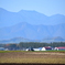 日高山脈とトラクター