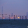海上電柱と工場夕景
