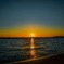 片目夕日、海照らす
