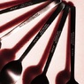Spoons in a Red Shadow