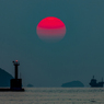 霞む夕日