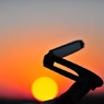 ハンドルの下の夕陽