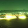 ヘッドライトと夜景