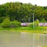 田植と鉄道の風景