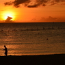 夕日と家族。