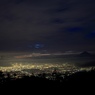 韮崎市街地の夜景と薄ら見える富士山