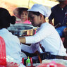 タイ、調理をする女性