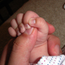 baby "grasp" dad's finger
