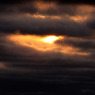 雲間から夕陽