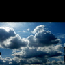 blue X black X clouds