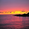The flame sky purple sea