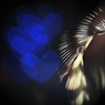 The heart that is blue on a feather﻿