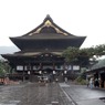 雨に煙る善光寺