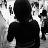 From behind