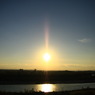 十勝川に映る夕日