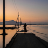 a Woman Wallking into the Sea_